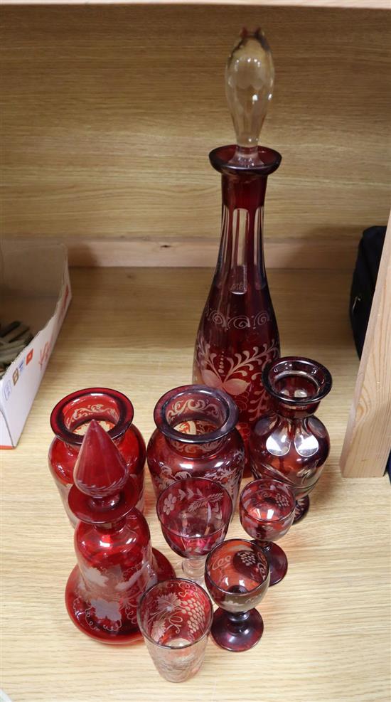 A group of Bohemian engraved ruby glass, tallest 42cm